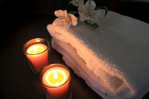 beeswax votive candles in a Green Spa setting