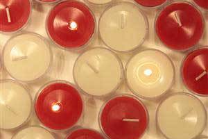 over shot of red and white pure beeswax tealight candles perfect for Valentine's Day