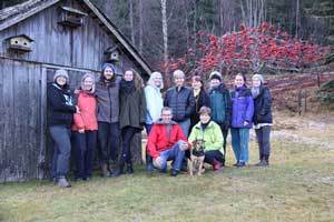 beautiful photo of Honey Candles staff in front of a rustic shed