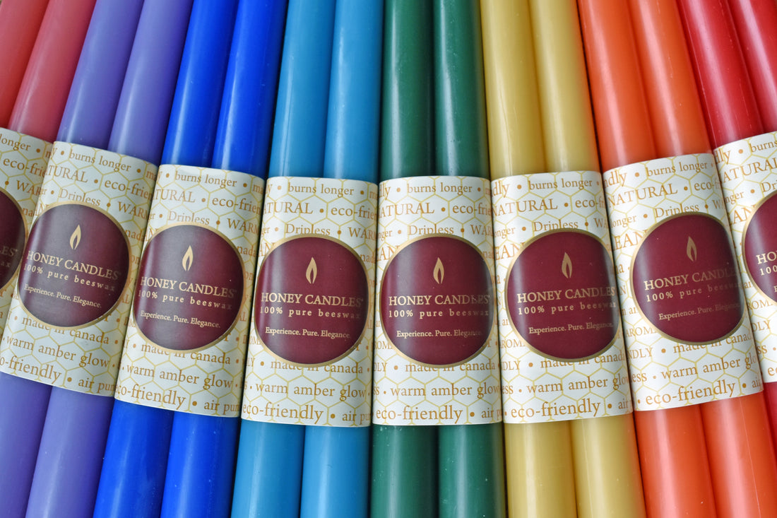 Coloured natural beeswax taper candles 