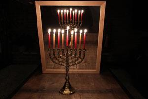 pure beeswax Hanukkah candles in a hanukkah holder