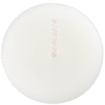 The top of a beeswax votive candle and wick, made from natural capping wax, white to pearl in color.