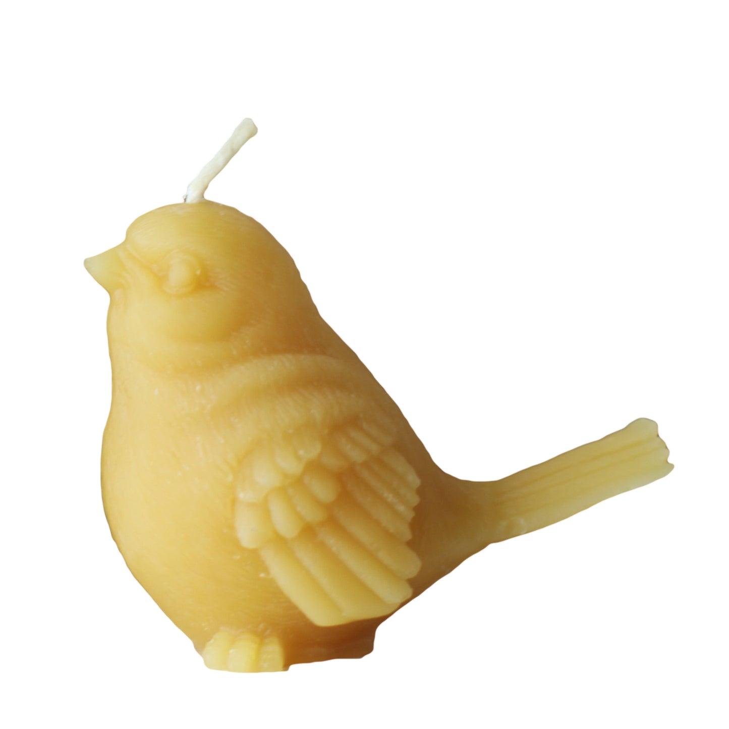 A product photo of a small bird beeswax candle in the shape of a sparrow on a white background.